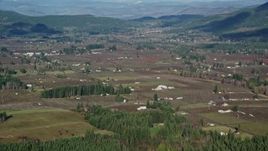 5.5K aerial stock footage approaching farms and farmland in Parkdale, Oregon Aerial Stock Footage | AX154_136E