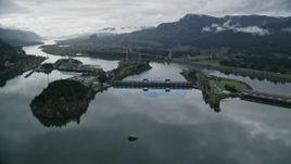 5.5K aerial stock footage approaching the Bonneville Dam in the Columbia River Gorge Aerial Stock Footage | AX154_175E
