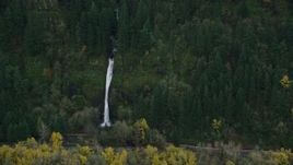 5.5K aerial stock footage tracking a waterfall through forest on the Oregon side of Columbia River Gorge Aerial Stock Footage | AX154_186