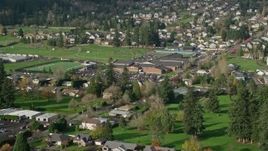 5.5K aerial stock footage approaching and flying over Washougal High School in Washougal, Washington Aerial Stock Footage | AX154_202