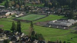 5.5K aerial stock footage orbiting Gause Elementary and the Washougal High School football field in Washougal, Washington Aerial Stock Footage | AX154_204