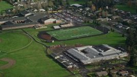 5.5K aerial stock footage flying away from Gause Elementary, Washougal High School, and sports fields in Washougal, Washington Aerial Stock Footage | AX154_209