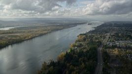 5.5K aerial stock footage following Highway 14 and the Columbia River toward the I-205 Bridge in Vancouver, Washington Aerial Stock Footage | AX154_215E