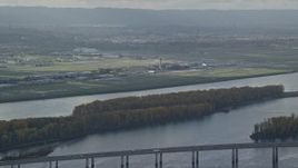 5.5K aerial stock footage of Portland International Airport seen from across the Columbia River Aerial Stock Footage | AX154_217