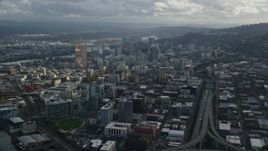 5.5K aerial stock footage of skyscrapers and Interstate 405 in Downtown Portland, Oregon Aerial Stock Footage | AX154_228