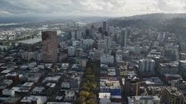 5.5K aerial stock footage passing US Bancorp Tower to approach and fly over downtown skyscrapers in Downtown Portland, Oregon Aerial Stock Footage | AX154_242E