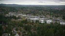 5.5K aerial stock footage approaching car dealerships in Southwest Portland, Oregon, and tilt to a bird's eye view of SW Canyon Road Aerial Stock Footage | AX155_014
