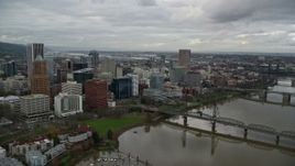5.5K aerial stock footage flying over Marquam Bridge to approach Riverplace Marina and Downtown Portland, Oregon Aerial Stock Footage | AX155_028E