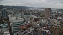 5.5K aerial stock footage flying by downtown buildings and US Bancorp Tower in Downtown Portland, Oregon Aerial Stock Footage | AX155_030E