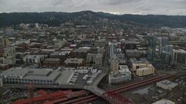 5.5K aerial stock footage flying by Union Station, apartment buildings, The Fields Park, and freeway interchange in Downtown Portland, Oregon Aerial Stock Footage | AX155_032E