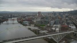 5.5K aerial stock footage orbiting the Fremont Bridge and reveal skyscrapers in Downtown Portland, Oregon Aerial Stock Footage | AX155_035E