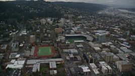 5.5K aerial stock footage approaching Providence Park beside Lincoln High School's football field Portland, Oregon Aerial Stock Footage | AX155_065