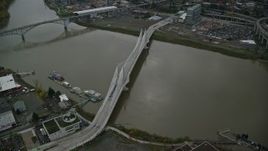 5.5K aerial stock footage of Tilikum Crossing bridge and the Willamette River in South Portland, Oregon Aerial Stock Footage | AX155_077E