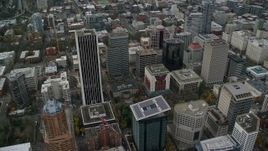 5.5K aerial stock footage orbiting Wells Fargo Center, Portland City Hall, and parks in Downtown Portland, Oregon Aerial Stock Footage | AX155_105E