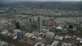 5.5K aerial stock footage flying by downtown skyscrapers and high-rises near the Willamette River in Downtown Portland, Oregon Aerial Stock Footage | AX155_109