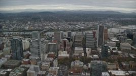5.5K aerial stock footage flying by downtown skyscrapers and high-rises near the Willamette River in Downtown Portland, Oregon Aerial Stock Footage | AX155_109E