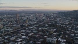 5.5K aerial stock footage flying over Northwest Portland at twilight to approach I-405 and Downtown Portland Aerial Stock Footage | AX155_143E