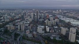 5.5K aerial stock footage orbiting skyscrapers and city streets near the Willamette River at twilight in Downtown Portland, Oregon Aerial Stock Footage | AX155_149E