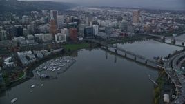 5.5K aerial stock footage of riverfront condos, marina and Downtown Portland at twilight, seen from across the Willamette River Aerial Stock Footage | AX155_152E