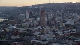 5.5K aerial stock footage flying by skyscrapers and high-rises in Downtown Portland, Oregon, twilight Aerial Stock Footage | AX155_156E
