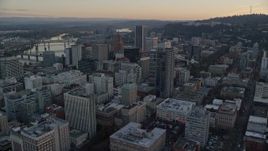 5.5K aerial stock footage flying over Park Avenue West Tower and Wells Fargo Center at twilight in Downtown Portland, Oregon Aerial Stock Footage | AX155_164E