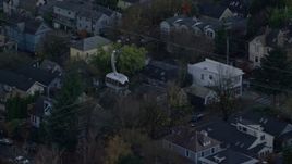 5.5K aerial stock footage tracking a gondola over I-5 freeway traffic and apartment buildings at twilight, South Portland, Oregon Aerial Stock Footage | AX155_193E