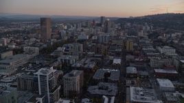 5.5K aerial stock footage flying over heavy rush-hour traffic on I-5 to approach skyscrapers Downtown Portland, Oregon, twilight Aerial Stock Footage | AX155_211E