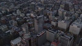 5.5K aerial stock footage flying over KOIN Center, Wells Fargo Center, and Portland City Hall at twilight, Downtown Portland, Oregon Aerial Stock Footage | AX155_215E