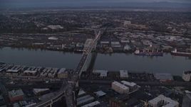 5.5K aerial stock footage orbiting the Fremont Bridge with heavy traffic spanning Willamette River at twilight, Portland, Oregon Aerial Stock Footage | AX155_217