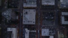 5.5K aerial stock footage of a bird's eye view of NW and 5th and 6th Avenue at twilight, reveal US Bancorp Tower, Downtown Portland, Oregon Aerial Stock Footage | AX155_222E