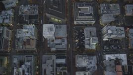 5.5K aerial stock footage of a bird's eye view of buildings between SW 6th Avenue SW 5th Avenue at twilight, reveal US Bancorp Tower, Downtown Portland, Oregon Aerial Stock Footage | AX155_233