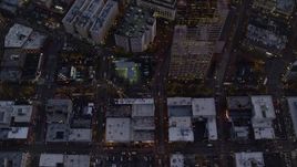 5.5K aerial stock footage of a bird's eye view of Union Station at twilight, follow NW 5th Avenue, Downtown Portland, Oregon Aerial Stock Footage | AX155_237E