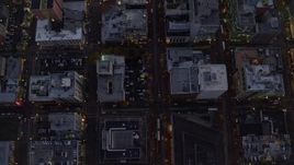 5.5K aerial stock footage of a bird's eye view follow SW 5th Avenue at twilight and reveal Pioneer Place and Courthouse, Downtown Portland, Oregon Aerial Stock Footage | AX155_240E