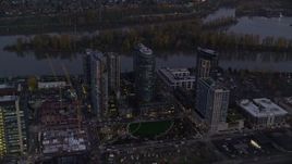 5.5K aerial stock footage approaching South Waterfront high-rise condo complexes by the Willamette River in Portland, Oregon, twilight Aerial Stock Footage | AX155_246E