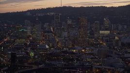 5.5K aerial stock footage of US Bancorp Tower and downtown skyscrapers at twilight, Downtown Portland, Oregon Aerial Stock Footage | AX155_258
