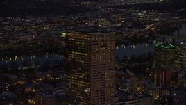 5.5K aerial stock footage orbiting the top of US Bancorp Tower at night in Downtown Portland, Oregon Aerial Stock Footage | AX155_275