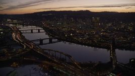 5.5K aerial stock footage of the Willamette River, bridges and Downtown Portland, Oregon at twilight Aerial Stock Footage | AX155_277