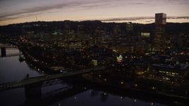 5.5K aerial stock footage fly over freeway interchange, Willamette River, Burnside Bridge, and Downtown Portland, Oregon at twilight Aerial Stock Footage | AX155_278E