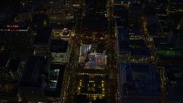5.5K aerial stock footage orbiting downtown to reveal Pioneer Courthouse Square, decorated for Christmas, and Pioneer Courthouse at night in Downtown Portland, Oregon Aerial Stock Footage | AX155_286E