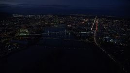 5.5K aerial stock footage following I-5 freeway, Downtown Portland cityscape, bridges on the Willamette River at night, Oregon Aerial Stock Footage | AX155_290E