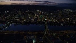 5.5K aerial stock footage of skyscrapers in downtown and Willamette River bridges at night, Downtown Portland, Oregon Aerial Stock Footage | AX155_294E
