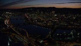 5.5K aerial stock footage of a view across the Willamette River of Downtown Portland, Oregon, at night Aerial Stock Footage | AX155_314E