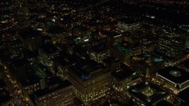 5.5K aerial stock footage orbiting city buildings at night in Downtown Portland, Oregon, and reveal the busy streets Aerial Stock Footage | AX155_330