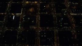 5.5K aerial stock footage of a brd's eye view of NW 5th and NW 6th Avenue at night through Downtown Portland, Oregon Aerial Stock Footage | AX155_333E