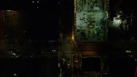 5.5K aerial stock footage of a bird's eye of SW Broadway and Pioneer Courthouse Square at night in Downtown Portland, Oregon Aerial Stock Footage | AX155_354E