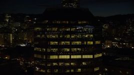 5.5K aerial stock footage flying by One Pacific Square at night, Downtown Portland, Oregon Aerial Stock Footage | AX155_369