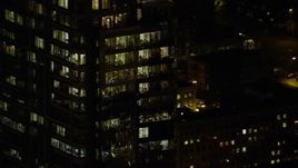 5.5K aerial stock footage orbiting the top floors of Park Avenue West Tower at nighttime in Downtown Portland, Oregon Aerial Stock Footage | AX155_387