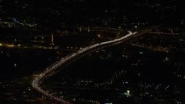 5.5K aerial stock footage of heavy traffic on the Fremont Bridge at night in Downtown Portland, Oregon Aerial Stock Footage | AX155_410E