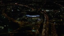 5.5K aerial stock footage following I-5 over interchange to approach Moda Center and convention Center at night in Northeast Portland, Oregon Aerial Stock Footage | AX155_420E