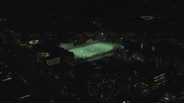 5.5K aerial stock footage approaching football practice at Portland State University sports field at night, Downtown Portland, Oregon Aerial Stock Footage | AX155_435